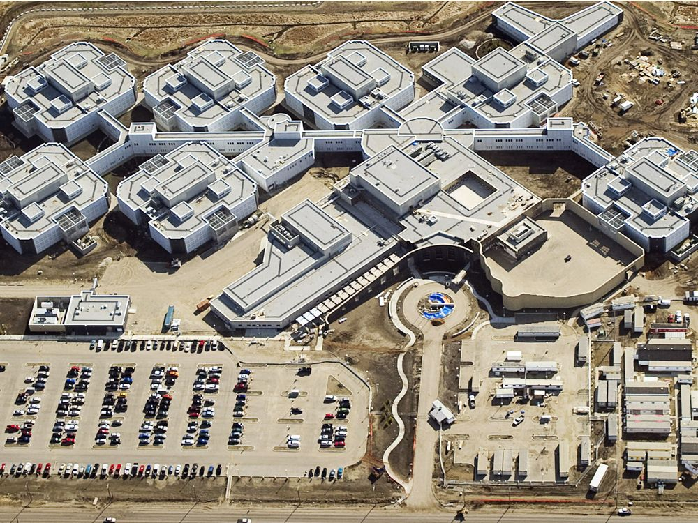 An aerial photo of the new Edmonton Remand Center, a complex of interconnected prison buildings